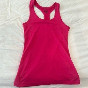 Nike dry-fit pink racer back tank. Size XS. Like new condition.